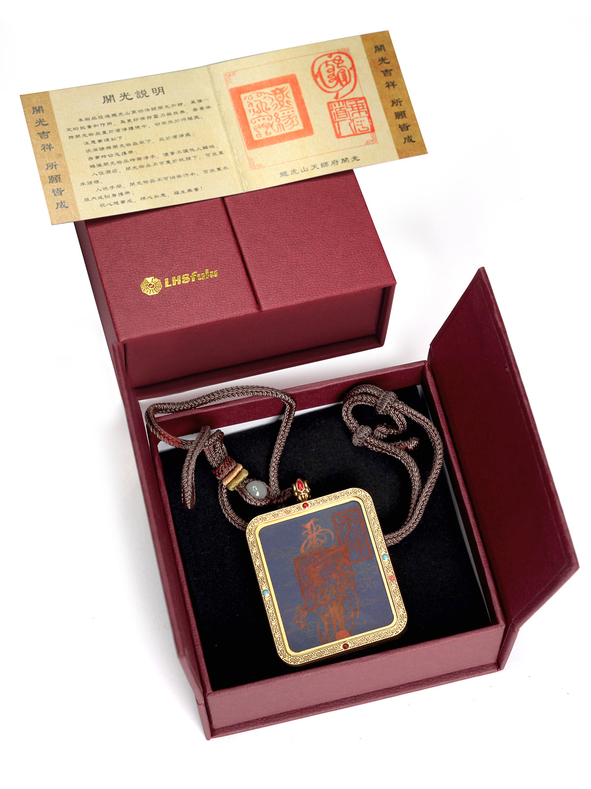 this talisman is personally hand-drawn by an orthodox Taoist master. An initiated High Priest then inscribes the talisman, channeling the sacred energy of the ancestral court, before sealing it within an exquisitely crafted Ghau box. This Peace & Safety Talisman serves to protect your body and safeguard your well-being, warding off malevolent influences and neutralizing negative energy. It helps you steer clear of disasters, mitigates the impact of unforeseen accidents, and provides the wearer with comp