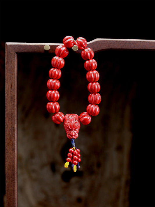 this piece merges the energies of authority, abundance, and protection from Eastern wisdom into one. Crafted from refined cinnabar into the dual forms of a pumpkin and a dragon head, it fuses the profound mystery of the Tao's natural way into a small space. It is an energy accessory that embodies a thousand-year spiritual tradition and contemporary craftsmanship.
