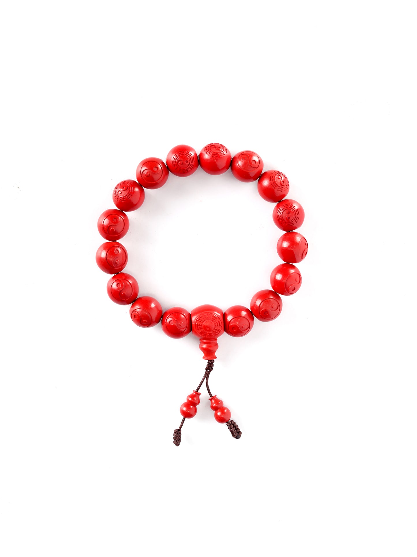 this piece merges the profound mysteries of the I Ching (Book of Changes) with the essence of Taoist rites. Crafted from refined Chenzhou Cinnabar carved into the form of the Taiji Bagua array, it embodies the principle of ""Yin and Yang in endless generation, the Bagua turning the cosmos."" It is a classic ritual implement that combines deep cultural heritage with spiritual protective energy.