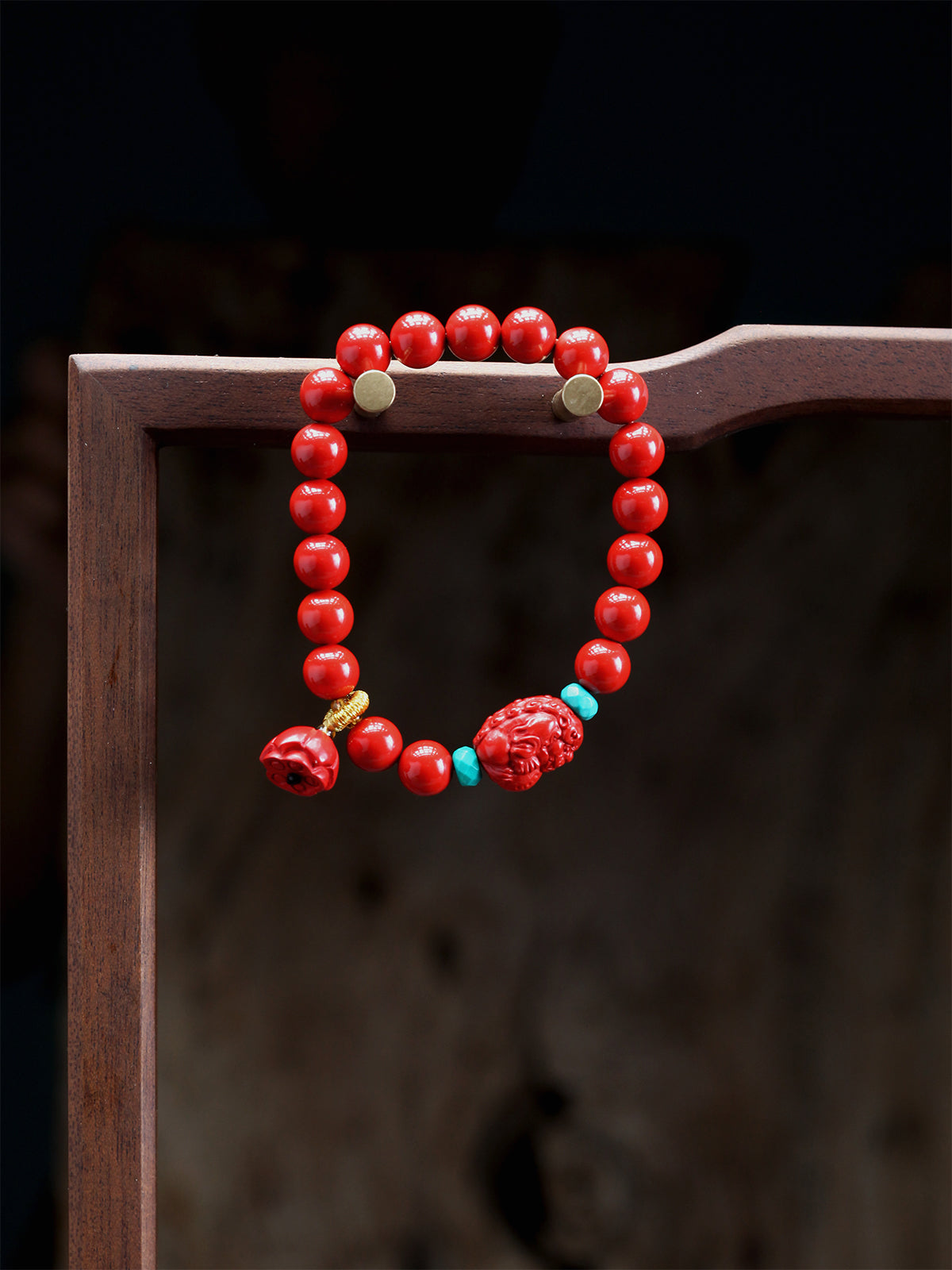 this piece draws upon the auspicious signs of the ""Pixiu gathering wealth, and the Lotus Pod gathering connections."" Crafted from refined Chenzhou Cinnabar into the forms of a guardian Pixiu and a seed-bearing Lotus Pod, it embodies the principle of ""All Requests Granted, and Ten Thousand Connections Harmonized."" It is a supreme ritual implement that merges a thousand-year spiritual tradition with profound protective energy.