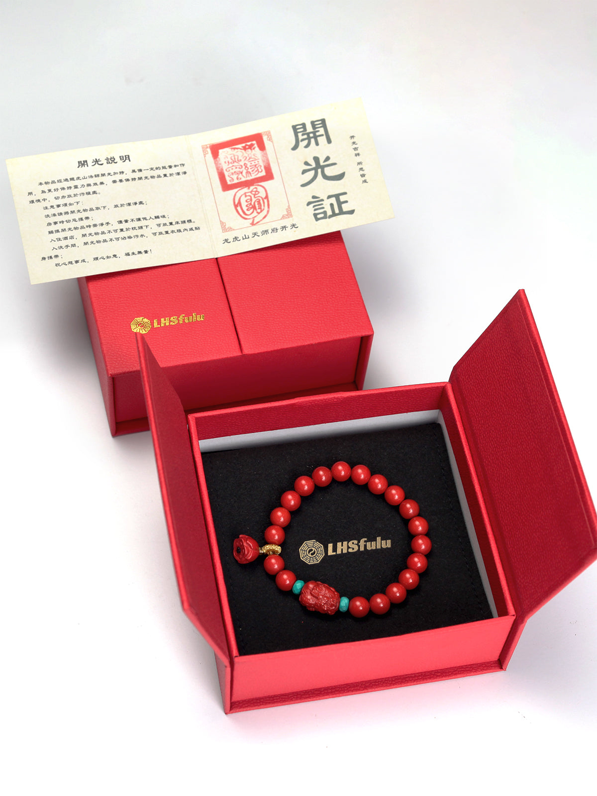 this piece draws upon the auspicious signs of the ""Pixiu gathering wealth, and the Lotus Pod gathering connections."" Crafted from refined Chenzhou Cinnabar into the forms of a guardian Pixiu and a seed-bearing Lotus Pod, it embodies the principle of ""All Requests Granted, and Ten Thousand Connections Harmonized."" It is a supreme ritual implement that merges a thousand-year spiritual tradition with profound protective energy.