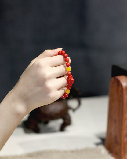 this piece draws upon the auspicious signs of the ""Pixiu gathering wealth, and the Lotus Pod gathering connections."" Crafted from refined Chenzhou Cinnabar into the forms of a guardian Pixiu and a seed-bearing Lotus Pod, it embodies the principle of ""All Requests Granted, and Ten Thousand Connections Harmonized."" It is a supreme ritual implement that merges a thousand-year spiritual tradition with profound protective energy.