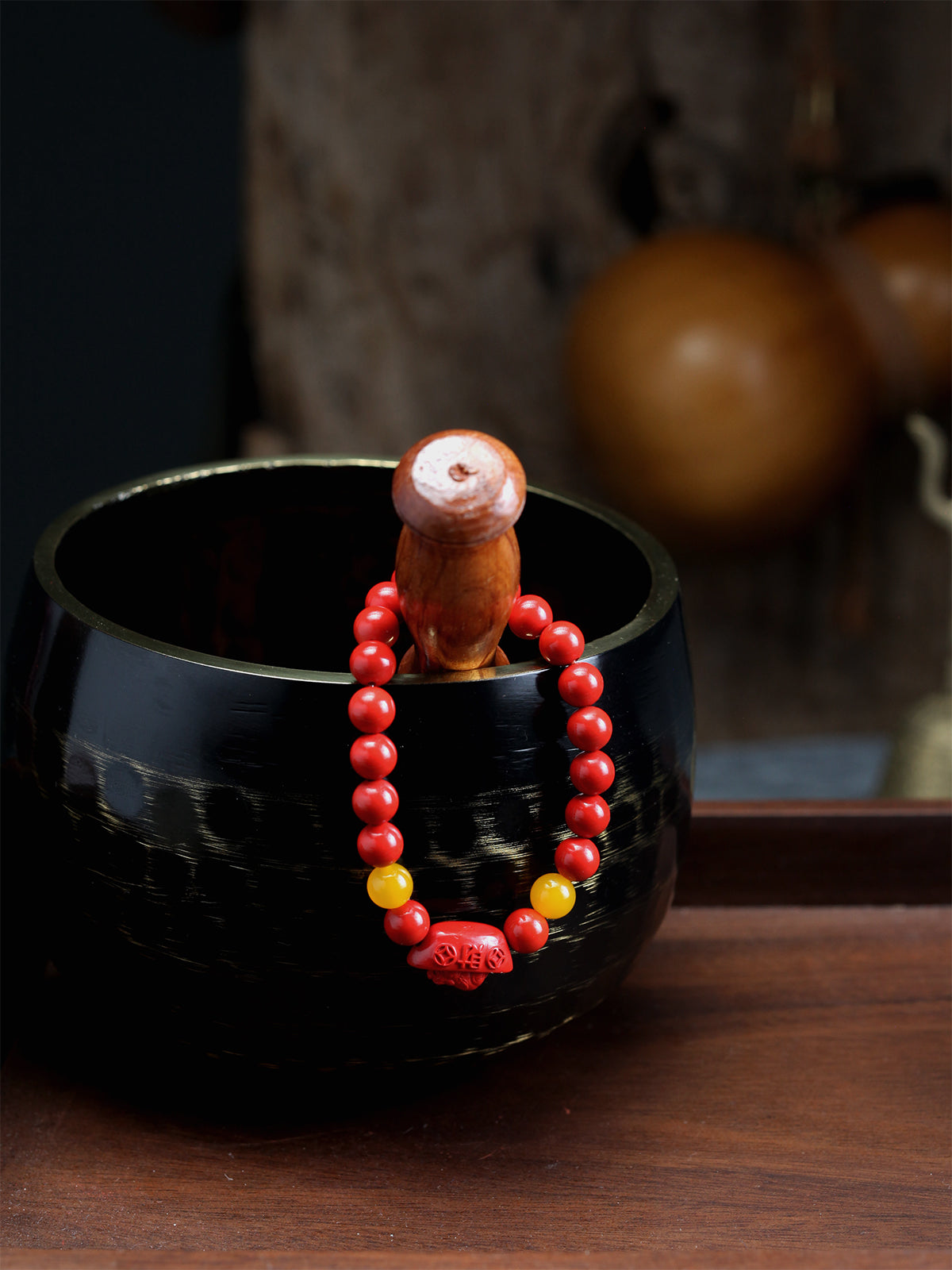 this piece draws upon the auspicious signs of the ""Pixiu gathering wealth, and the Lotus Pod gathering connections."" Crafted from refined Chenzhou Cinnabar into the forms of a guardian Pixiu and a seed-bearing Lotus Pod, it embodies the principle of ""All Requests Granted, and Ten Thousand Connections Harmonized."" It is a supreme ritual implement that merges a thousand-year spiritual tradition with profound protective energy.