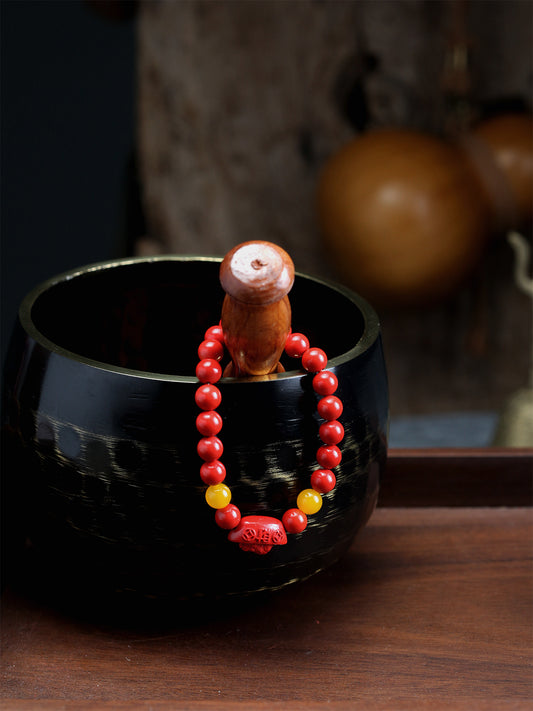 this piece draws upon the auspicious signs of the ""Pixiu gathering wealth, and the Lotus Pod gathering connections."" Crafted from refined Chenzhou Cinnabar into the forms of a guardian Pixiu and a seed-bearing Lotus Pod, it embodies the principle of ""All Requests Granted, and Ten Thousand Connections Harmonized."" It is a supreme ritual implement that merges a thousand-year spiritual tradition with profound protective energy.