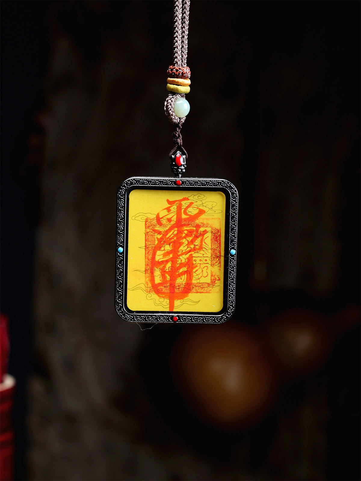 this secret evil-repelling talisman is personally hand-drawn by a resident High Priest. An initiated master then inscribes it, channeling the sacred energy of the ancestral court, before sealing it within an exquisitely crafted Ghau box.