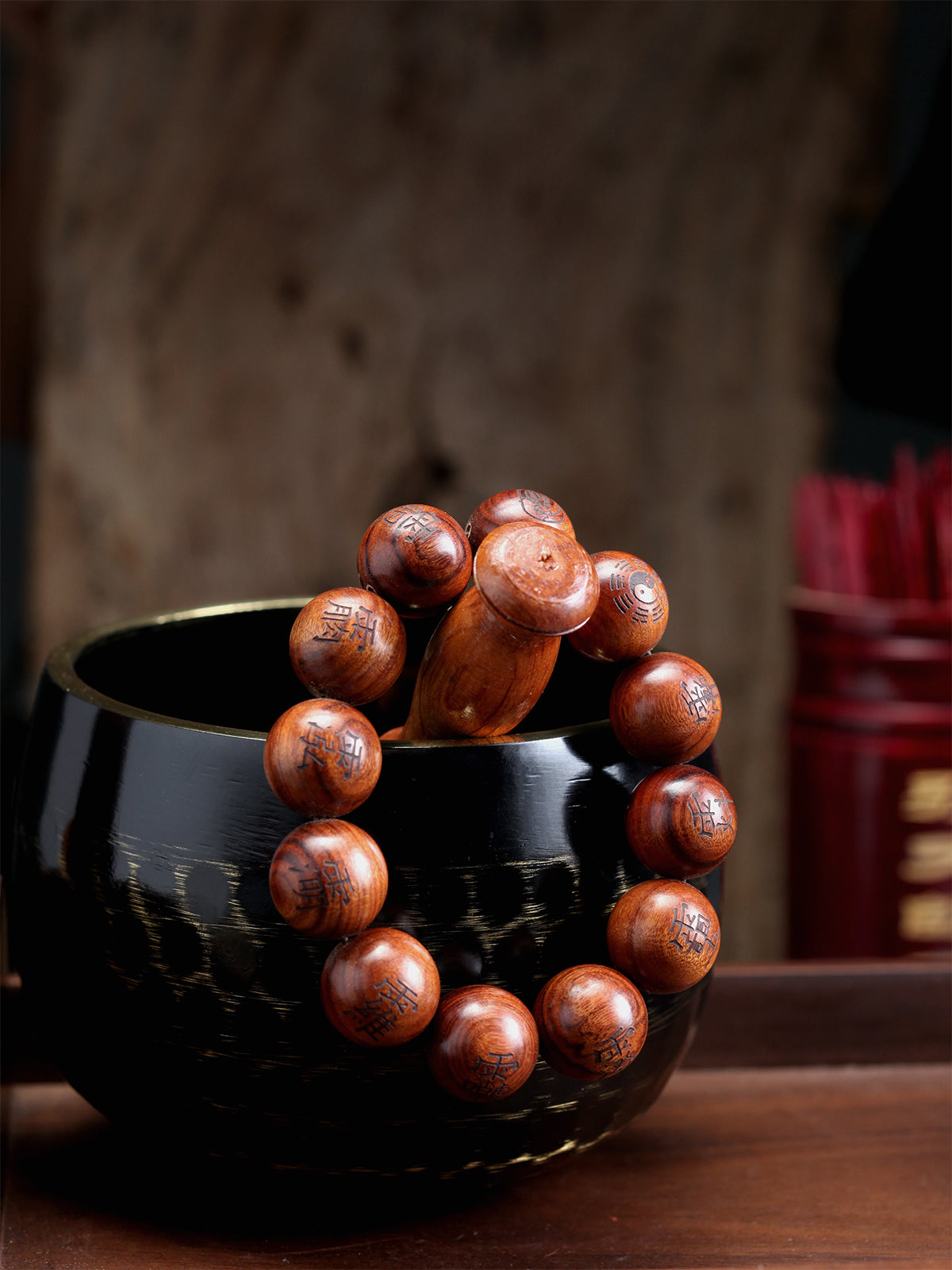 This bracelet is crafted from specially selected natural thunderstruck wood of exceptionally strong energy. Upon the surface of the beads are not ordinary talismanic script, but rather the 'Mihui' (Secret Celestial Names), personally hand-drawn by a High Priest of Longhu Mountain. 'Mihui' are the core cosmic passwords and secret designations of the deities in the celestial realm. They are the most direct path to communicating with the power of a specific divinity. Each Secret Name corresponds to a single de