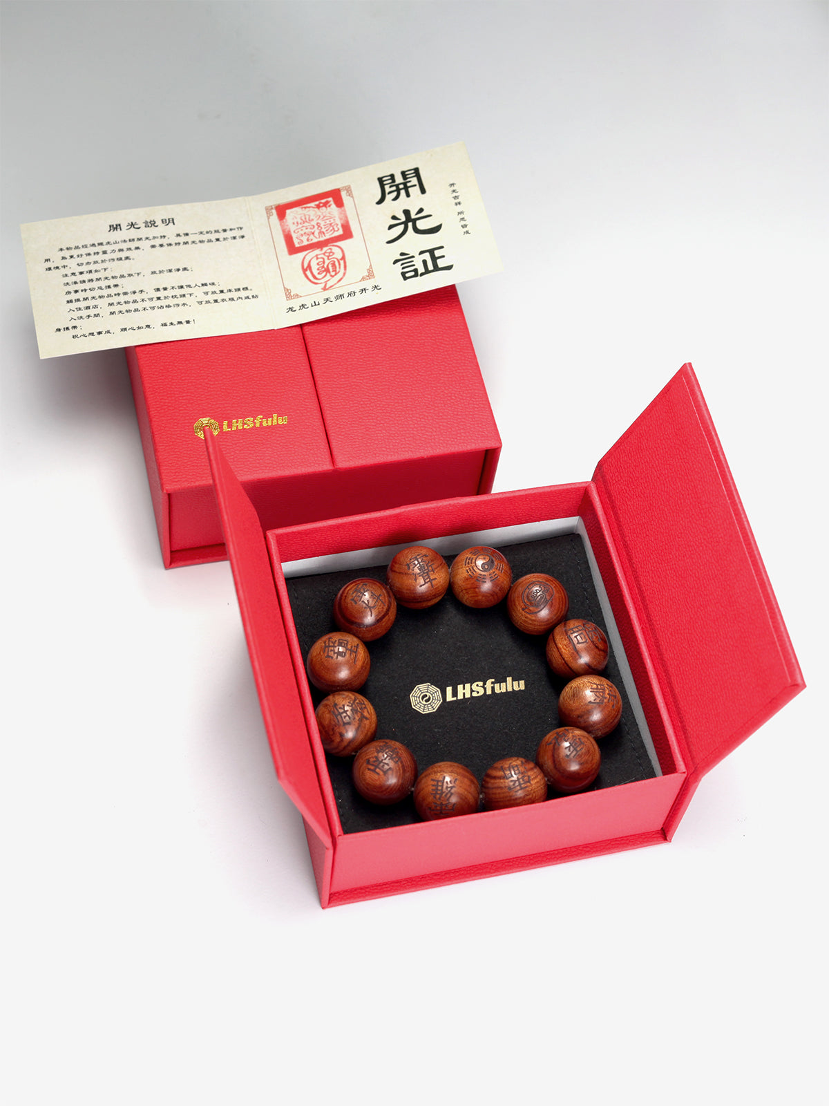 This bracelet is crafted from specially selected natural thunderstruck wood of exceptionally strong energy. Upon the surface of the beads are not ordinary talismanic script, but rather the 'Mihui' (Secret Celestial Names), personally hand-drawn by a High Priest of Longhu Mountain. 'Mihui' are the core cosmic passwords and secret designations of the deities in the celestial realm. They are the most direct path to communicating with the power of a specific divinity. Each Secret Name corresponds to a single de