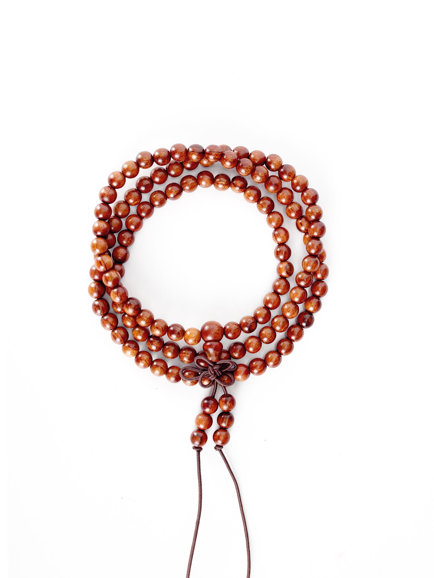 This long strand is composed of 108 thunderstruck wood beads, each one tempered by the power of natural lightning. It is created without any concrete symbols or writing, returning to the most authentic and primordial state of energy. To be wordless is to embody 'emptiness' (Śūnyatā), and thus, it can infinitely carry and resonate with your every state of mind and intention in the present moment.