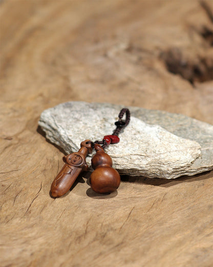 this is a creation that gathers the great power of Heaven, Earth, and Nature. Crafted from meticulously selected 100-year-old thunderstruck jujube wood, which carries the energy of both a century of time and the power of lightning, the secret 'Five Thunders Seal-Talisman' is carved into its foundation of ultimate-yang and unyielding energy, perfectly merging the divine power of nature with the secret rites of the Tao.